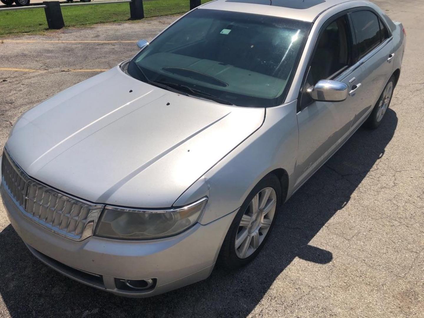 2009 SILVER LINCOLN MKZ (3LNHM26T79R) with an 3.5L engine, Automatic transmission, located at 850 South Mill Street, Pryor, 74361, (918) 825-3030, 36.293549, -95.324440 - Photo#0