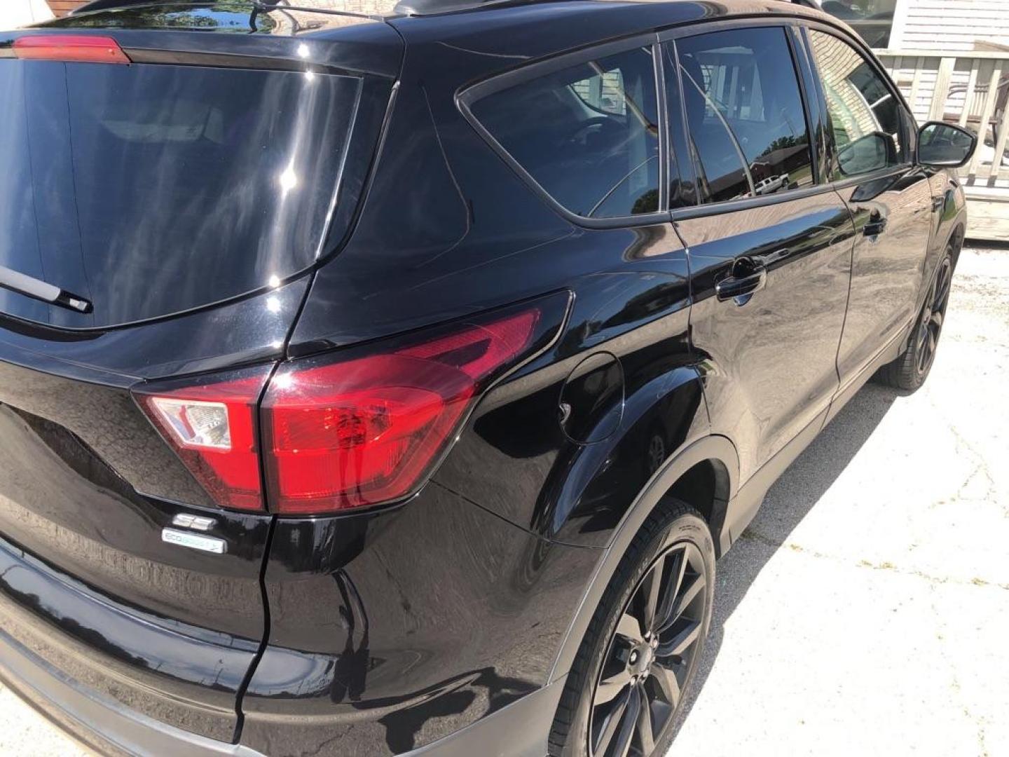 2019 BLACK FORD ESCAPE SE (1FMCU0GD7KU) with an 1.5L engine, Automatic transmission, located at 850 South Mill Street, Pryor, 74361, (918) 825-3030, 36.293549, -95.324440 - Photo#25